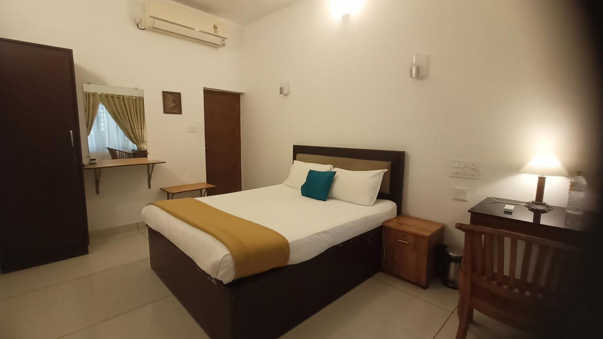 Athirapilly On The Rocks Hotel Атхирапали Стая снимка